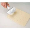 Rouleau pique pâte plastique 12 cm